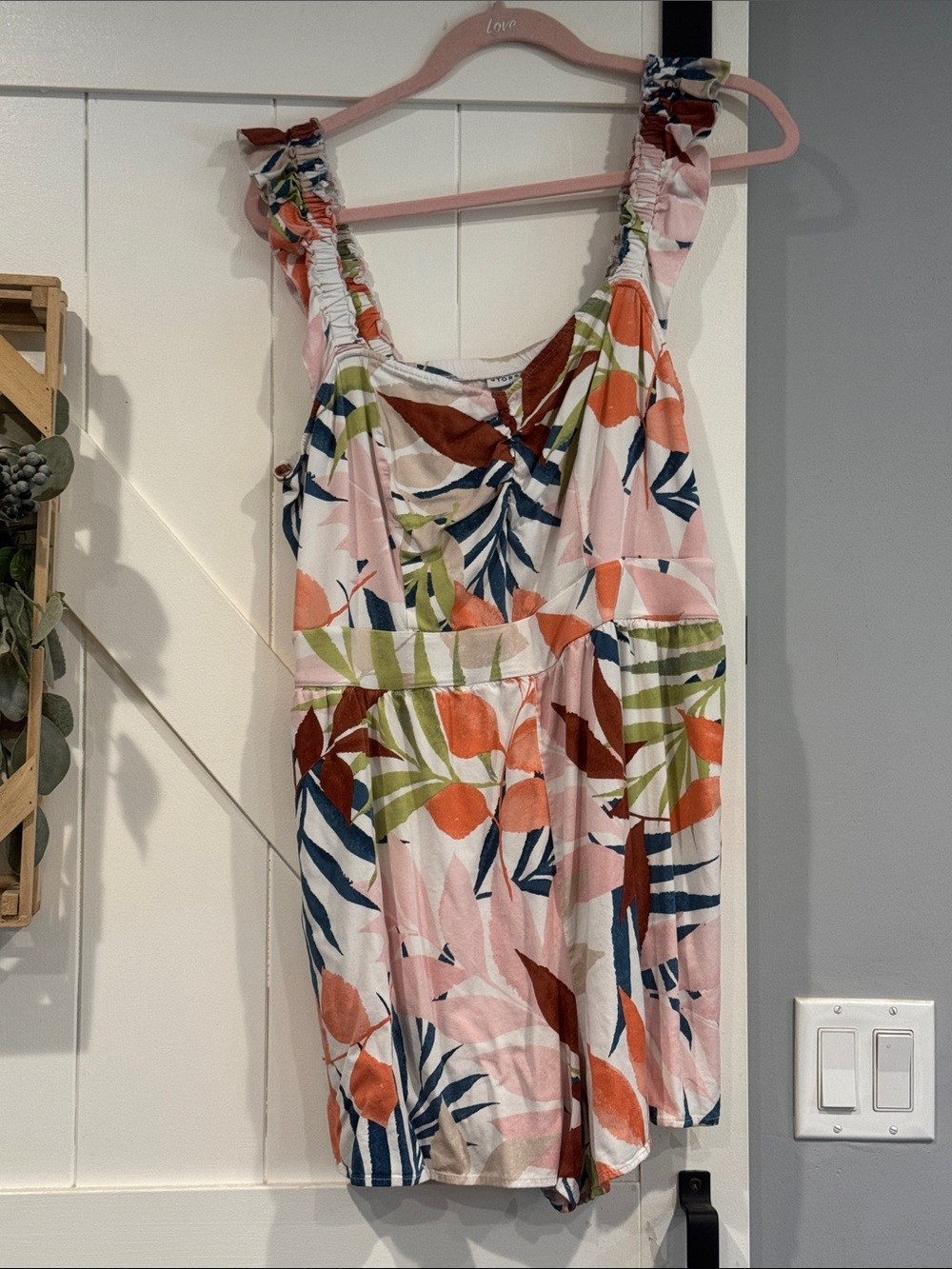 Torrid size 1 
Floral Print Pink Romper with Leaf Motif
